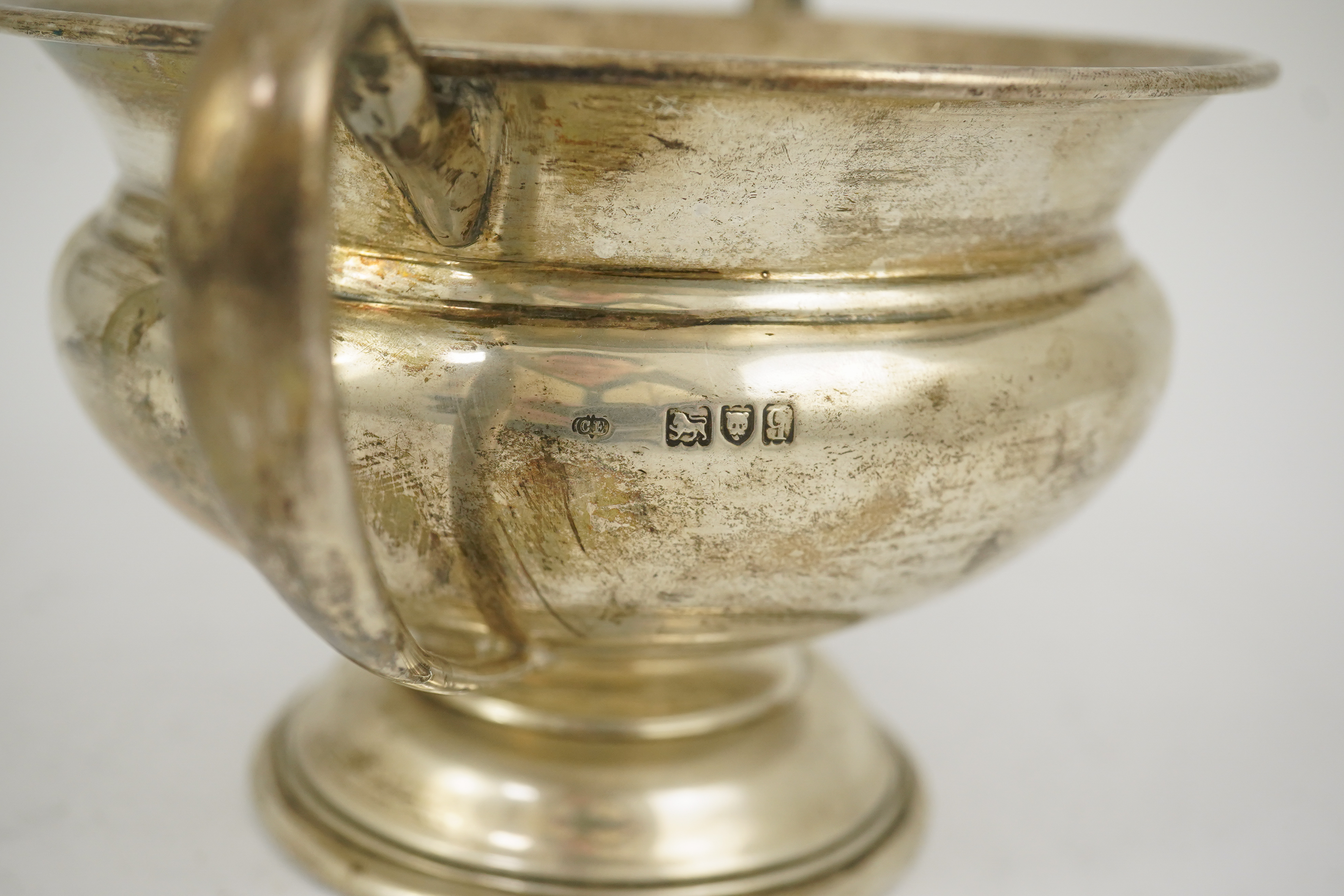 A George V silver two handled pedestal bowl, by Charles Edwards